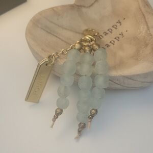 NEW FOUNT HOPE TASSEL CHARM IN CELADON